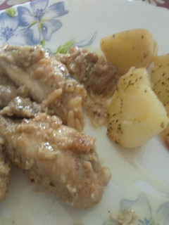 Una foto de Pollo con cerveza y picada de almendras