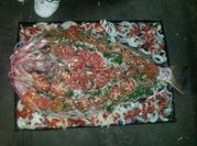 Una foto de corvina al horno