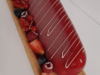 Bûche mousse vanille et crémeux fruits rouges