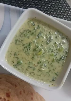 A picture of Methi Matar Malai in White Gravy.