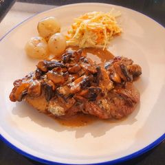 A picture of Beef fillet in creamy mushroom and gorgonzola sauce.