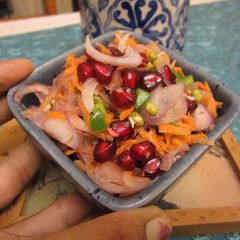 A picture of Sprouts and Pomegranate Salad in a Ginger Lemon Dressing.