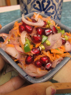 A picture of Sprouts and Pomegranate Salad in a Ginger Lemon Dressing.