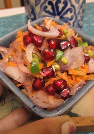 A picture of Sprouts and Pomegranate Salad in a Ginger Lemon Dressing.