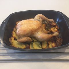 A picture of Judy’s roast chicken with crispy potatoes.