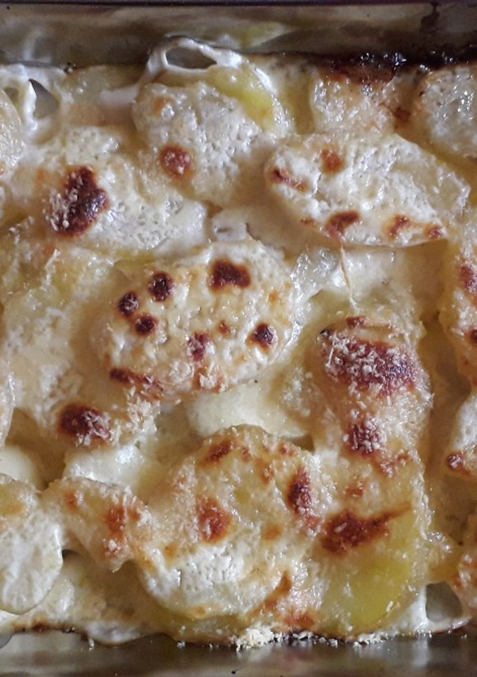 Una foto de Papas Gratinadas con Queso y Crema