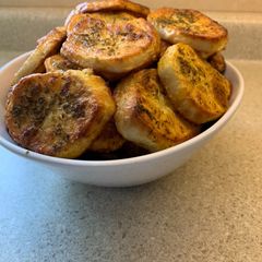 A picture of Sliced baked potatoes.