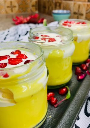 A picture of Custard fruit trifle in cups.