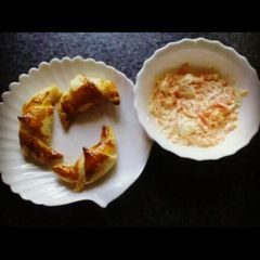 Cheesy mini croissants with coleslow salad A picture of Cheesy mini croissants with coleslow salad.
