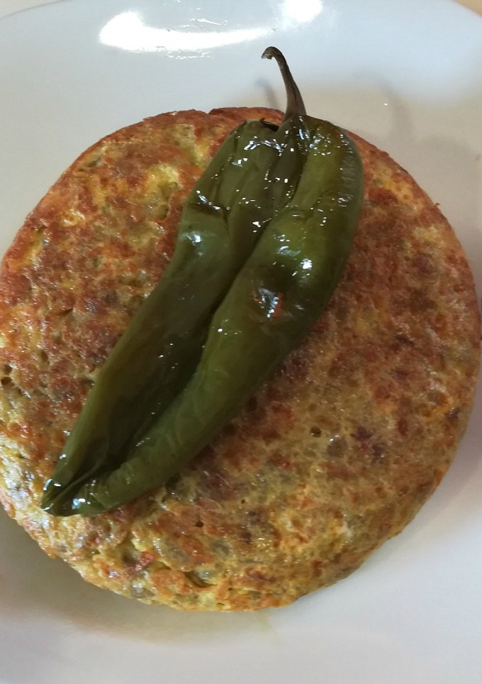 Una foto de Tortilla de patatas trituradas