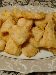 Una foto de Filetes de merluza fritos en trocitos