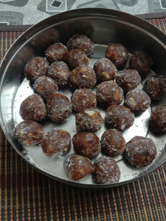 A picture of Dates laddu with dryfruits.