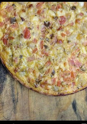 Una foto de Tarta de berenjena, tomate y queso. Sin tacc