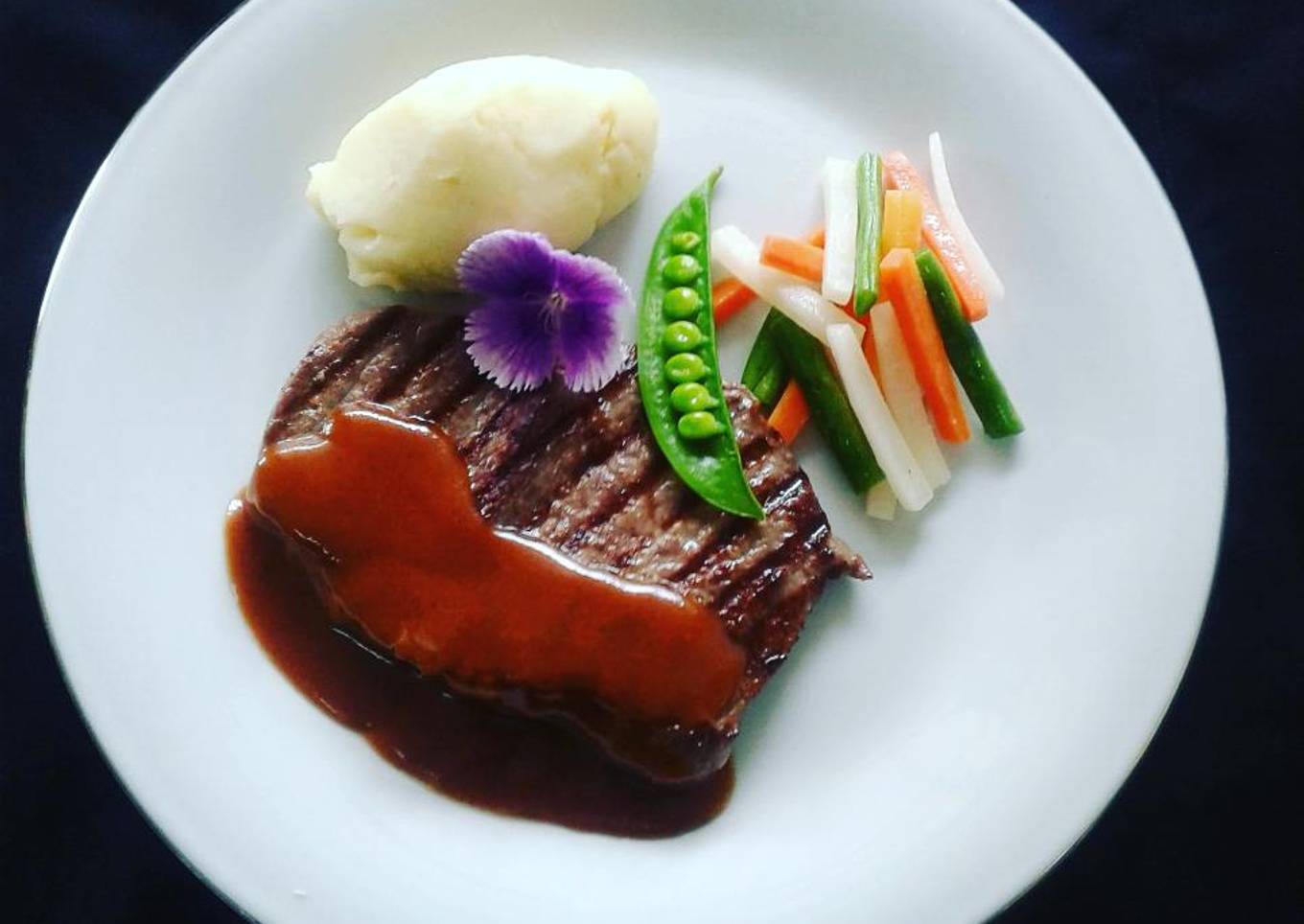 Beef steak with demiglace sauce, mashed potato
