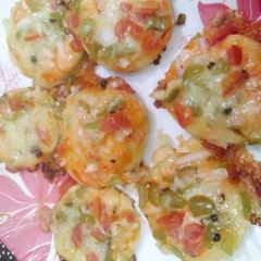 A picture of Mini vegetables pizza bite.
