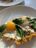 Eggs Fried in Parmesan Breadcrumbs with Wilted Spinach