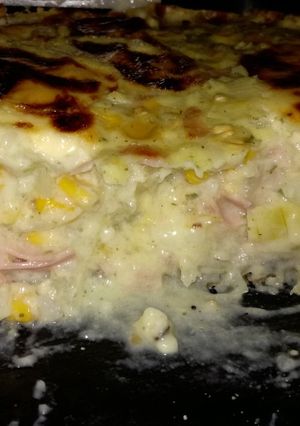 Una foto de Tarta de choclo, cebolla, jamón y muzzarella