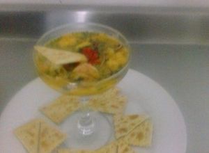 Una foto de Ceviche de Corvina en Salsa de Chontaduro