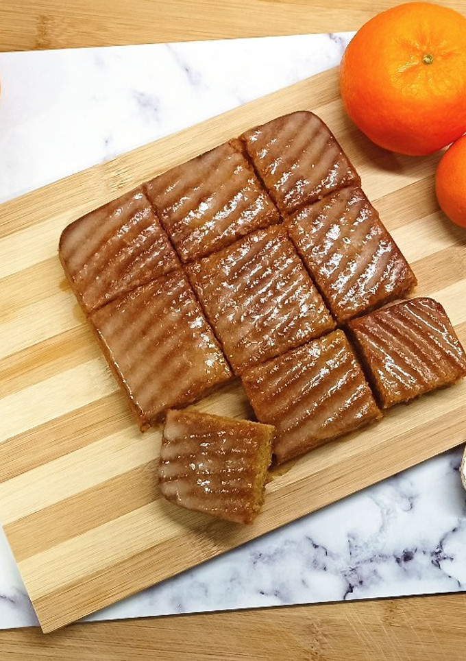 Una foto de Bocaditos de mandarina 🍊 con glaseado 🥧