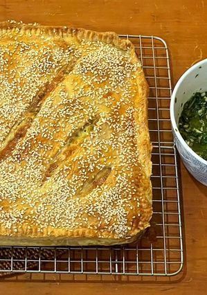 A picture of Potato slab pie with salsa verde.