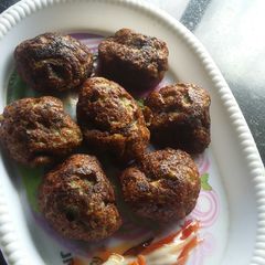 A picture of Moog Gajar Appe(Whole Green Moong Carrot Appe).