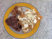 Una foto de chilaquiles con chile de arbol
