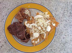 Una foto de Chilaquiles rojos
