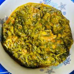 A picture of Kulfa curry cooked with Walnuts.