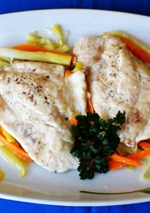 Una foto de Filete de dorada en papillote