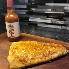 A picture of Top Shelf Collection's baked salmon.