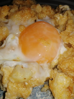Una foto de Coliflor esparragada con huevo cuajado