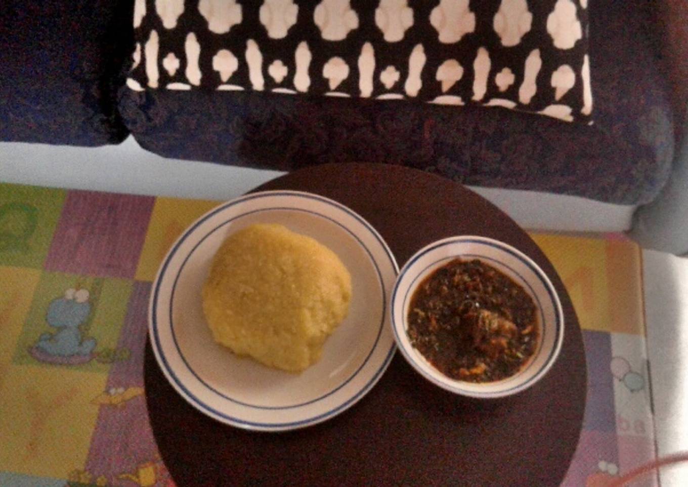Vegetable soup with goat meat and Eba(Garri)
