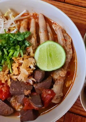 A picture of 🍅🌶Khanom Jeen Nam Ngiao (Northern Thai Noodle Soup)🌶🍅.