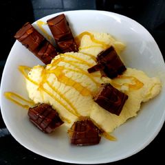 My Sons Dairy Ice cream with Bueno Chocolate bar & Syrup 🤩 A picture of My Sons Dairy Ice cream with Bueno Chocolate bar & Syrup 🤩.