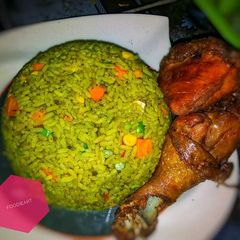 A picture of Fried rice and honey dipped fried chicken. #EnuguState.
