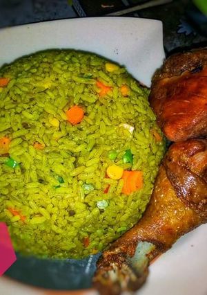 A picture of Fried rice and honey dipped fried chicken. #EnuguState.