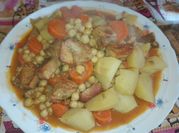 Una foto de lomo de cerdo con patata