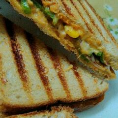 A picture of Grilled cheese corn sandwich.