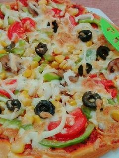 صورة لوصفة بيتزا بالخضار