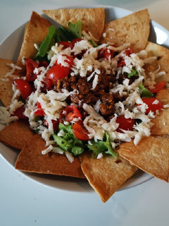 A picture of Baked nacho taco salad.