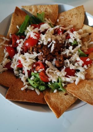 A picture of Baked nacho taco salad.