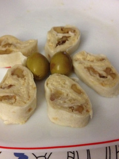 Una foto de Rollitos con crema de queso y manzana caramelizada