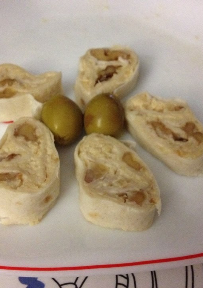 Una foto de Rollitos con crema de queso y manzana caramelizada