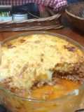 Pastel de mandioca con carne gratinado