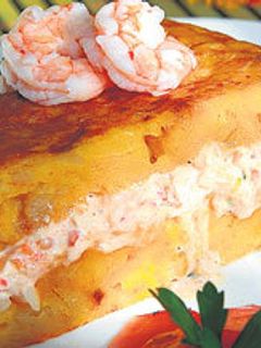 Una foto de Tortilla de papa rellena de camarón