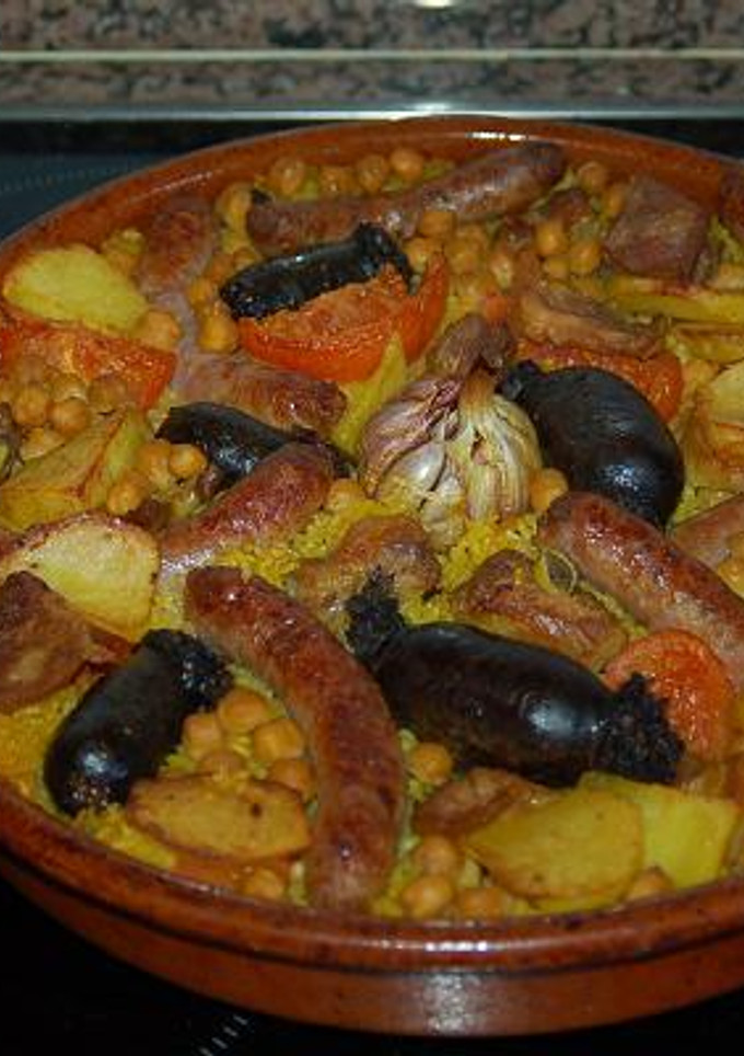 Una foto de Arroz al horno con caldo de cocido