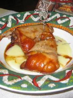 Una foto de Cochinillo asado