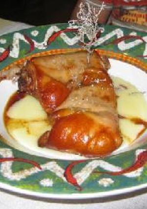 Una foto de Cochinillo asado