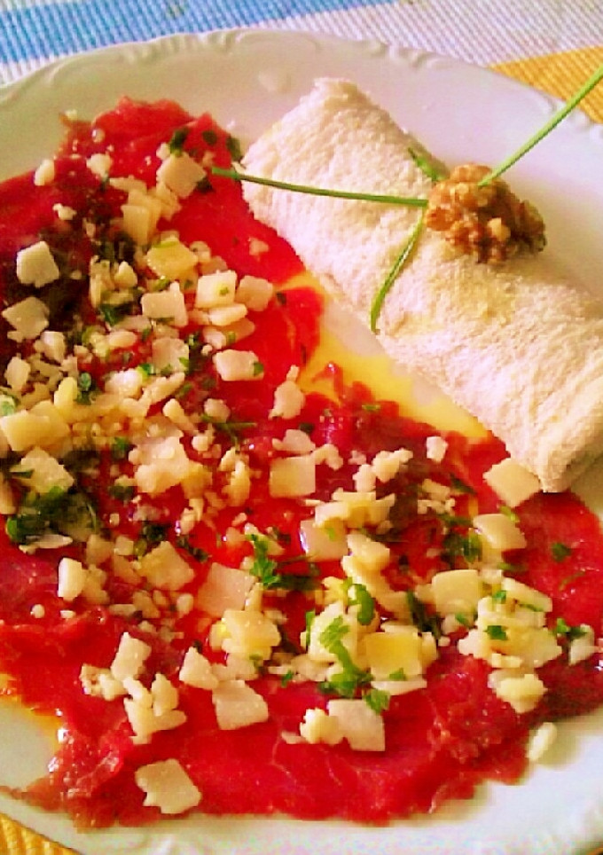 Una foto de Carpaccio de ternera a mi manera