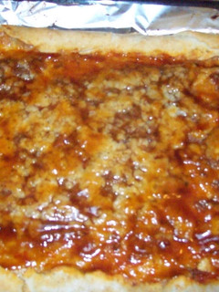 Una foto de Pizza Boloñesa a la barbacoa
